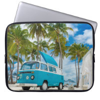 Blue and white van on beach