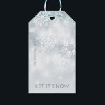 Blue and White Winter Snow Gift Tags<br><div class="desc">This gift tag features a soft dusty blue background with softly falling white snowflakes. Personalise it with your family name and the year. Perfect for Christmas or Hanukkah gifts. Created by Simply Farmhouse Press.</div>