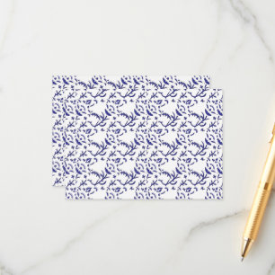 Blue and white wrapping paper featuring a graphic  enclosure card