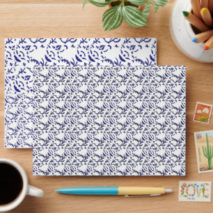Blue and white wrapping paper featuring a graphic envelope