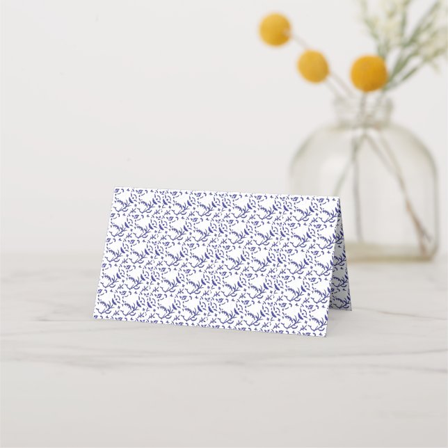 Blue and white wrapping paper featuring a graphic  place card (Front)
