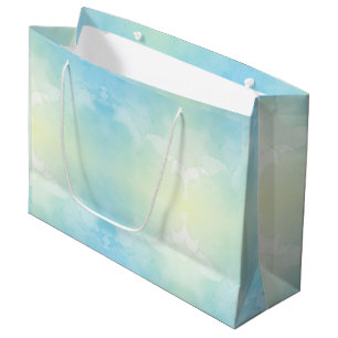 Blue and yellow gradient gift bag with white