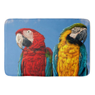 Blue and yellow macaw and a Scarlet macaw Bath Mat