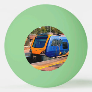 Blue and yellow train ping pong ball
