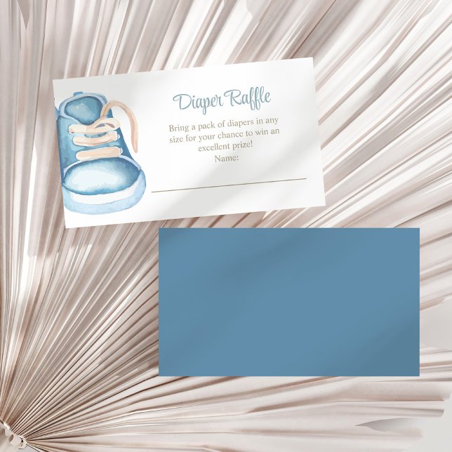 Blue Baby Shoes Diaper Raffle Enclosure Card (Blue Baby Shoes Diaper Raffle Enclosure Card on a white dry palm leaf.)