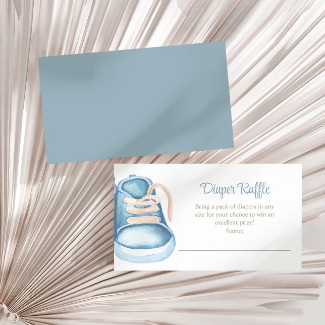 Blue Baby Shoes Diaper Raffle Enclosure Card (Blue Baby Shoes Diaper Raffle Enclosure Card on a sunny white dry palm leaf.)
