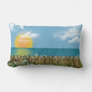 blue bicycle with sunset reflection over water lumbar cushion