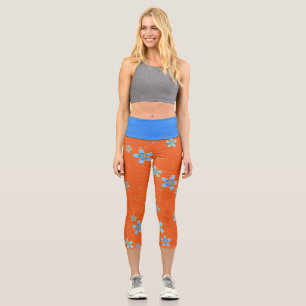 Blue Blossoms on Orange Capri Leggings