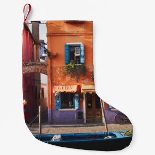 BLUE BOAT ON RIVER NEAR ORANGE BUILDING SMALL CHRISTMAS STOCKING