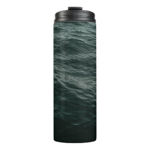 BLUE BODY OF WATER DURING DAYTIME THERMAL TUMBLER