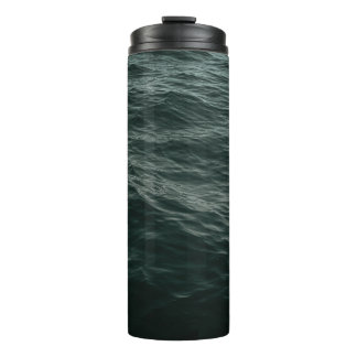 BLUE BODY OF WATER DURING DAYTIME THERMAL TUMBLER
