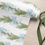 Blue Bow Winter Green Wrapping Paper<br><div class="desc">This wrapping paper features a soft, elegant design with light blue bows and green pine branches arranged in a repeating pattern. The delicate watercolor-style illustration gives it a serene and festive feel, ideal for a winter or Christmas theme. The white background enhances the airy and clean aesthetic, making it perfect...</div>