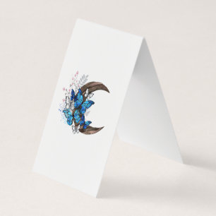 Blue butterflies on wooden crescent