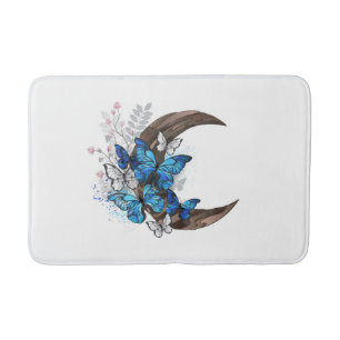 Blue butterflies on wooden crescent bath mat