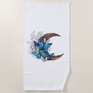 Blue butterflies on wooden crescent beach towel