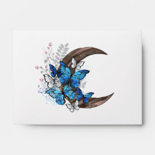 Blue butterflies on wooden crescent envelope