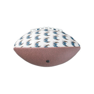 Blue butterflies on wooden crescent football
