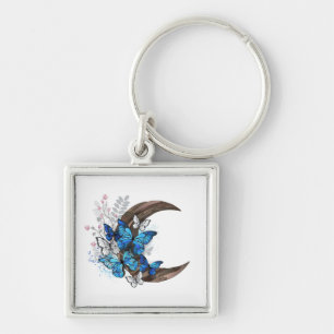 Blue butterflies on wooden crescent key ring