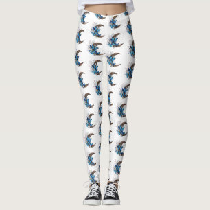 Blue butterflies on wooden crescent leggings