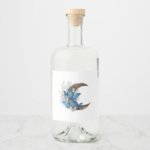 Blue butterflies on wooden crescent liquor bottle label