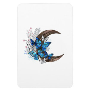 Blue butterflies on wooden crescent magnet
