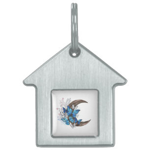 Blue butterflies on wooden crescent pet ID tag