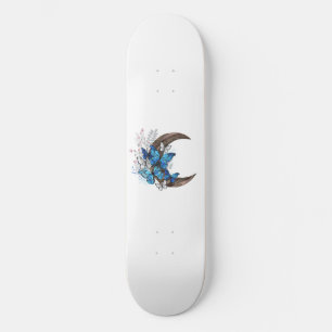 Blue butterflies on wooden crescent skateboard