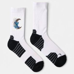 Blue butterflies on wooden crescent socks