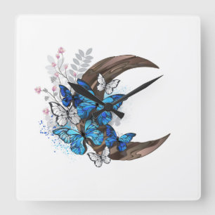 Blue butterflies on wooden crescent square wall clock