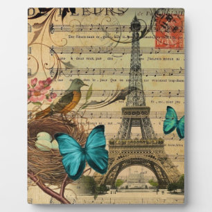 Blue butterfly Robin bird nest Paris Eiffel Tower Plaque