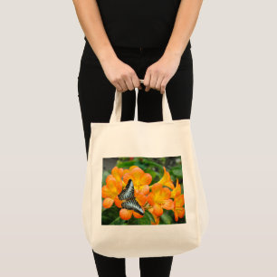 Blue butterfly with Tropical Rhododendron Tote Bag