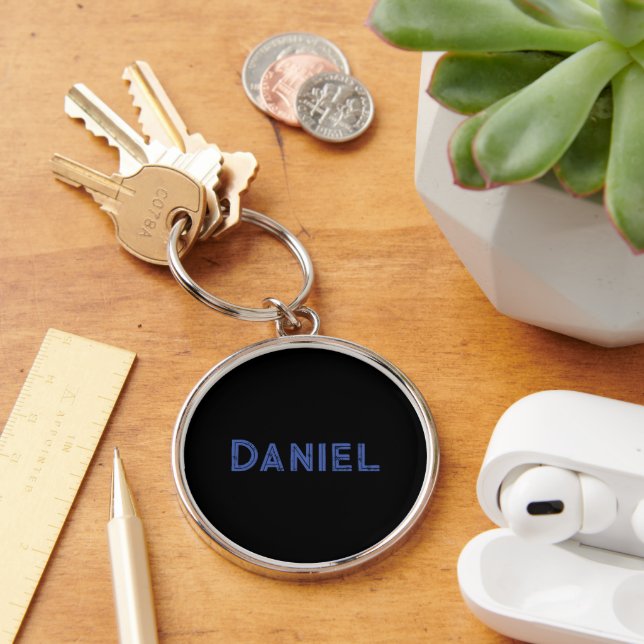 Blue custom name on black key ring (Desk)