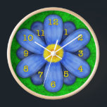 Blue Daisy Flower on Green Beautiful Wall Clock<br><div class="desc">This pretty floral clock has an original stylised flower on it, in a daisy style and coloured blue. The yellow-orange clock numbers mark the time on the twelve petals. The background is done in an abstract mottled green, resembling grass. This is a bright, bold clock for a gardener or any...</div>