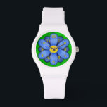 Blue Daisy Flower on Green Beautiful Watch<br><div class="desc">This pretty floral wristwatch has an original stylised flower, in a daisy style and coloured blue. The yellow-orange watch numbers mark the time on the twelve petals. The background is done in an abstract mottled green, resembling grass. This is a bright, bold watch and would make a unique gift for...</div>