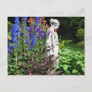 Blue delphinium flower garden and statue postcard