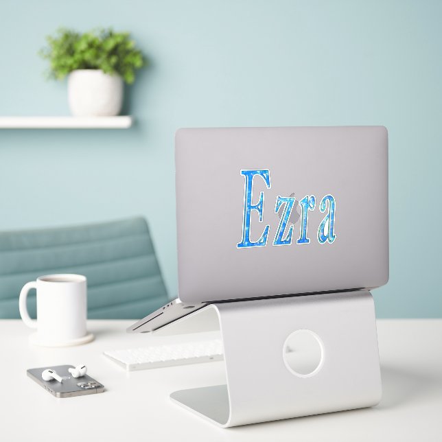 Blue Designed Ezra Name, (Laptop On Desk)