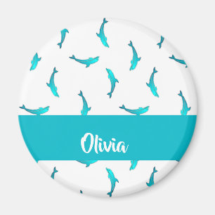 Blue dolphins on white magnet
