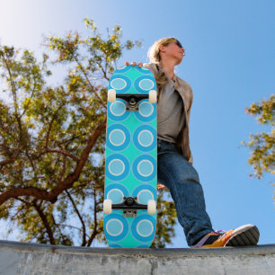 Blue Doughnuts With Filling On Turquoise Skateboard