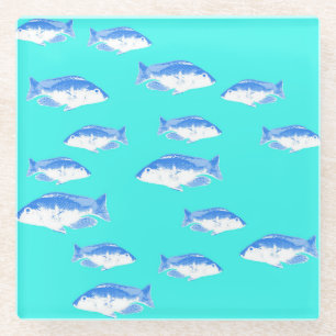 Blue fish on turquoise glass coaster