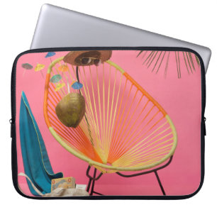 Blue flip-flop beside chair laptop sleeve