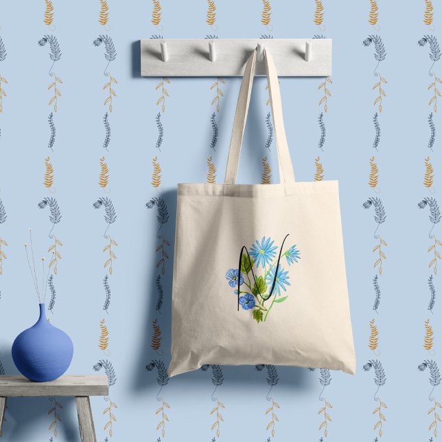 Blue flower in watercolour with your initial. tote bag (Creator Uploaded)