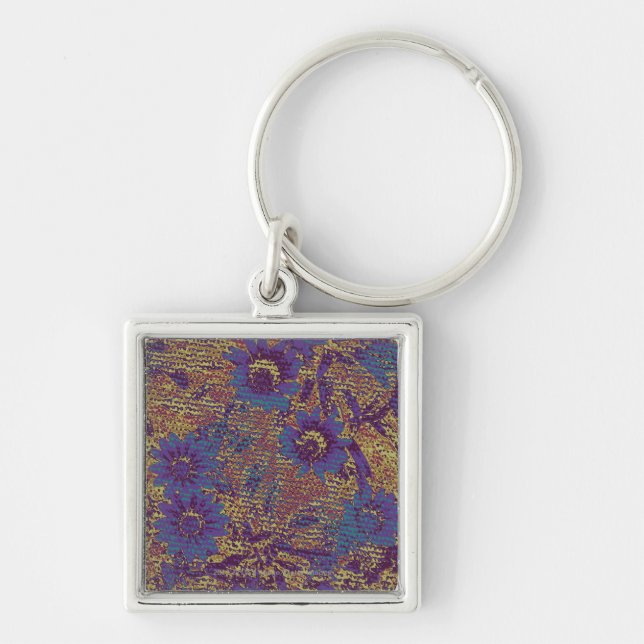 Blue flowers against leaf camouflage pattern key ring (Front)