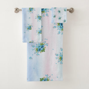 Blue forget-me-not's on a soft pink-blue bath towel set