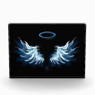 Blue Glowing Angel Wings on black background Photo Block