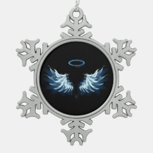 Blue Glowing Angel Wings on black background Snowflake Pewter Christmas Ornament