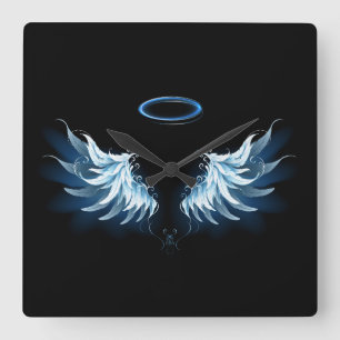 Blue Glowing Angel Wings on black background Square Wall Clock