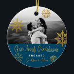 Blue Gold Snowflakes First Christmas Engaged Ceramic Ornament<br><div class="desc">Bright Christmas holiday photo ornament with gold snowflakes and navy blue background for engaged couple. Personalise it by adding your names. It's a good gift for newly weds or for a fiance/fiiancee.</div>