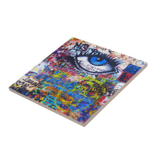 Blue graffiti evil eye tile