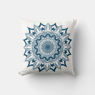 Blue-green ornate symmetrical mandala cushion