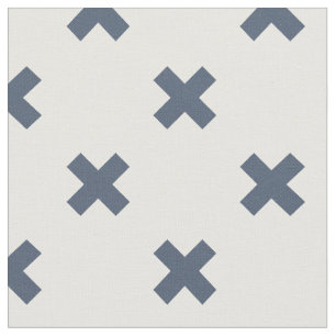Blue-grey cross stitches on white fabric